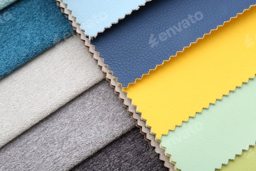 Preview: Samples of different fabrics as background, top view