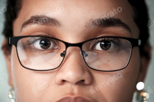 Preview: Black woman portrait, eye vision and glasses of a young person eyes at health consultation. Lens, f