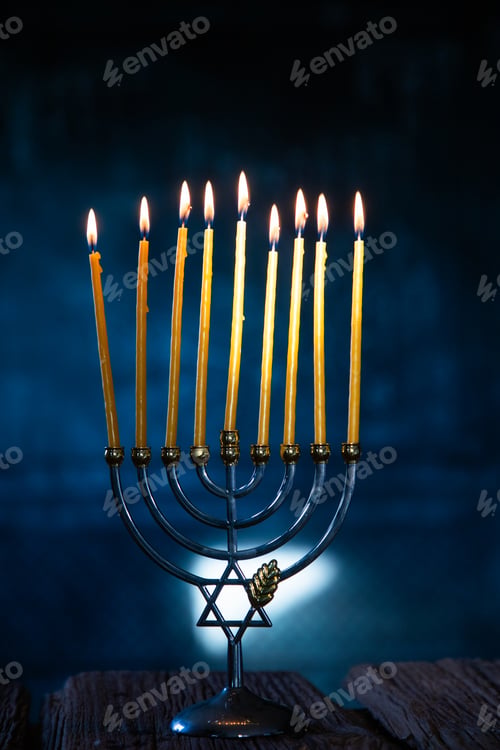 Preview: candles burning in menorah for Hannukah