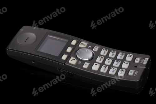 Preview: Wireless phone, isolated on black background, with clipping path