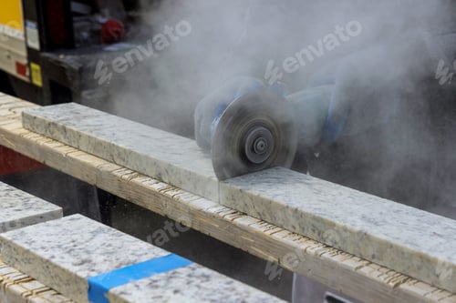 Preview: Marble cutting at construction site close up industrial tool, grinder cutting piece of granite stone