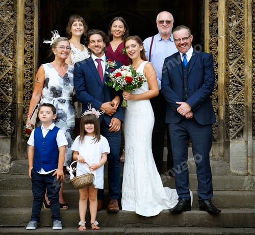 Preview: Bride and groom with their families
