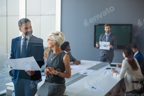 Preview: Business people working as a team at the office