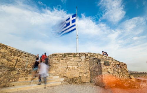 Preview: Greek flag waving against blue sky