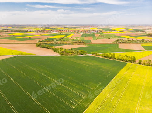 Preview: Colorful agricultural fields at spring, aerial drone view