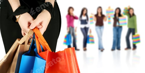 Preview: Group Of Happy Girls Or Women Smiling And Carrying Shopping Bags Isolated Over A White Background