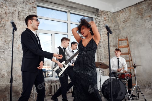 Preview: Young international musicians, a band performing on the loft stage. The concept of music, hobby