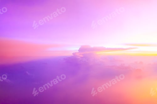 Preview: Vibrant Sky Above Clouds at Sunrise or Sunset