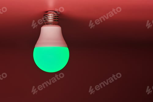 Preview: Green light bulb, modern energy saving, copy space. Minimal idea concept.