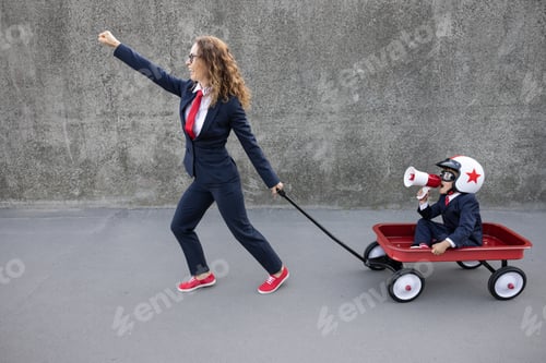 Preview: Happy woman and child going to work outdoor