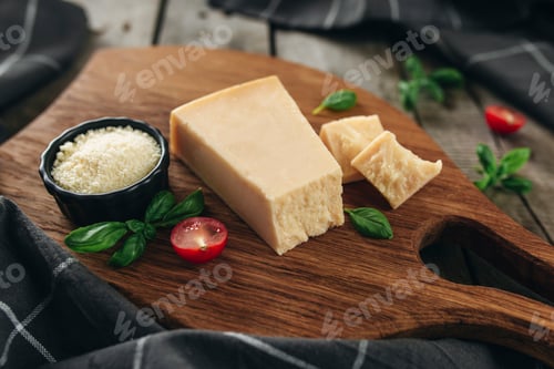 Preview: Italian cuisine concept. Parmesan Cheese chunks, cherry tomatos, basil leaves