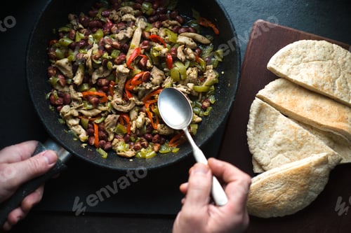Preview: Man is stuffed with tortillas stuffing for fajita