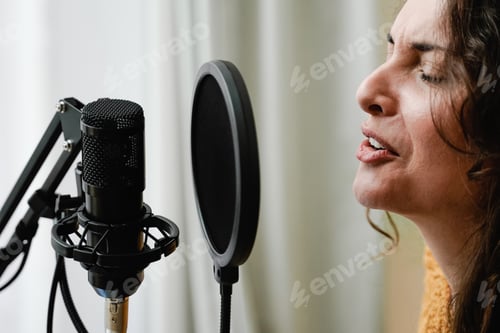 Preview: Latin singer recording song for new album inside music production studio