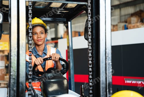 Preview: Portrait of a female worker with a forklift in the warehouse., Industrial and industrial concept.