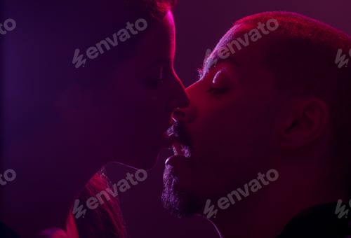 Preview: Young Adult Caucasian, Straight (Heterosexual) Couple, Man And Woman, Sensual Kissing. Colorful