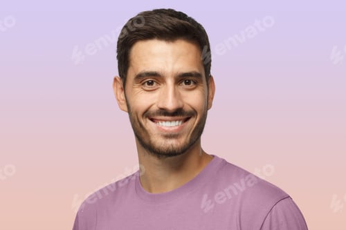 Preview: Smiling attractive man in t-shirt isolated on purple background