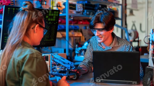 Preview: Teens doing experiments in robotics in a laboratory