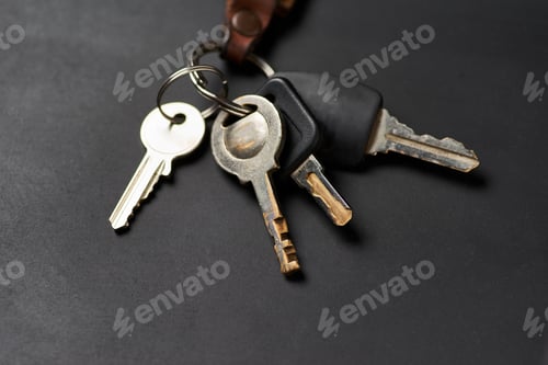 Preview: The bunch of keys on the black floor