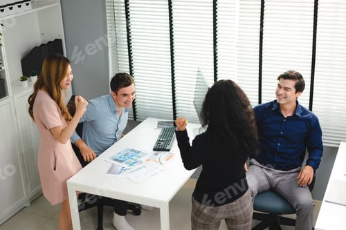 Preview: Successful entrepreneurs and business people group achieving goals, happy corporate team