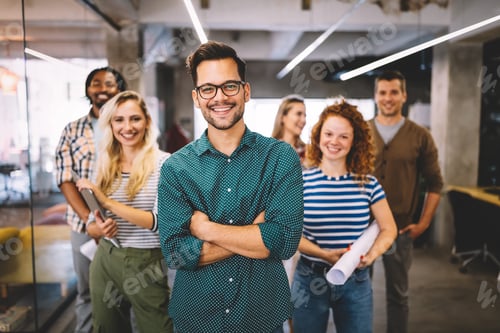 Preview: Group of successful business people designers architects in office