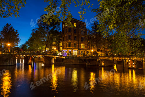 Preview: Canal waterfront and bridge at night, Amsterdam, Netherlands