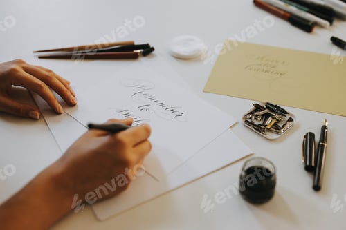 Preview: Calligraphy artist working on a project.