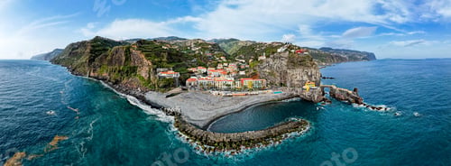 Preview: Ponta do Sol in Madeira Island, Portugal. Aerial drone view at cityscape of coastal town and beach