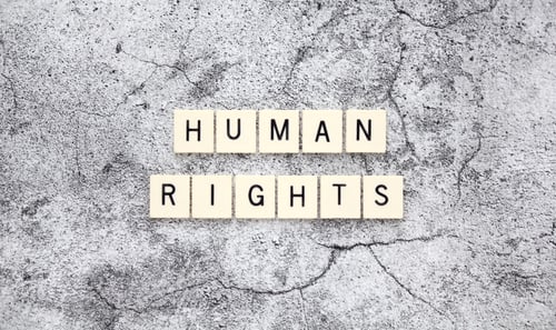 Preview: Human Rights word tiles on a cracked concrete background