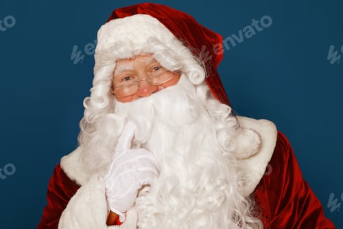 Preview: Happy authentic Santa Claus on blue background