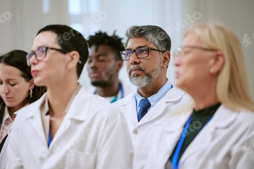Preview: Diverse Group of Middle Aged Medical Professionals Attending Conference