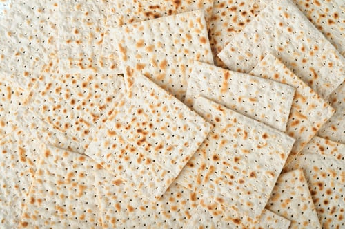 Preview: Matzah, red kosher and walnut. Passover celebration concept. Traditional ritual Jewish bread backgro