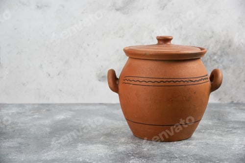 Preview: Single clay antique vase placed on marble surface