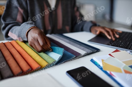 Preview: Designer working with colored palette