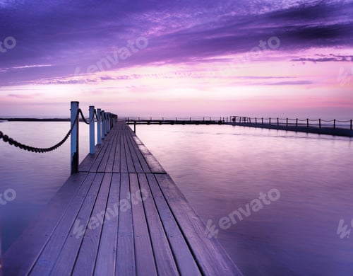 Preview: A purple dawn over a Rockpool and a jetty