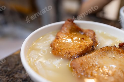 Preview: Grilled pork with noodles soup in restaurant