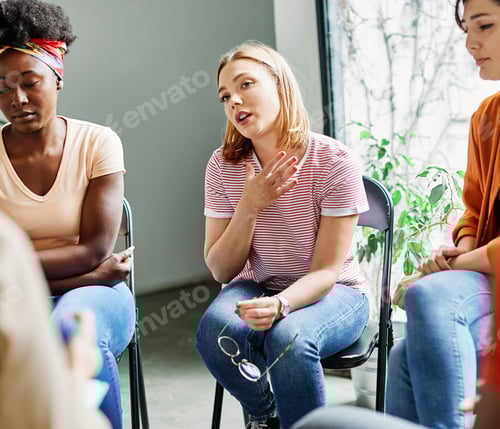 Preview: Women Participating in Counseling Session in Bright Room
