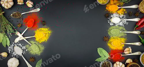 Preview: Various spices and herbs in spoons on a dark table.Food background. Banner. Copy space.