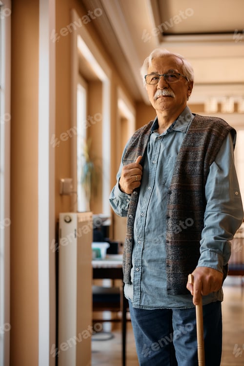 Preview: Portrait of senior man at nursing home looking at camera.
