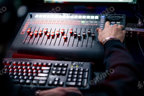 Preview: close up the recording room dark with neon lighting in the studio the sound engineer works with the