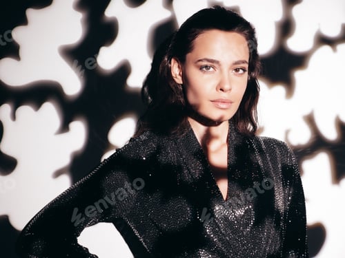 Preview: Young fashion woman posing in studio