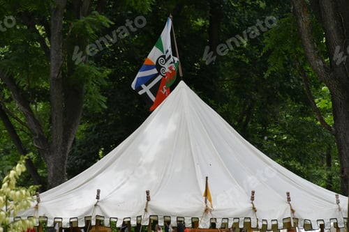 Preview: A tent with banners at a Renaissance Fair Faire