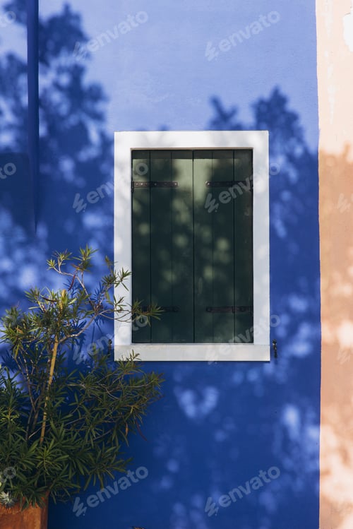 Preview: Burano house blue wall window shutters