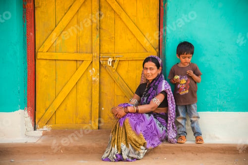 Preview: Rural woman in front of her house at village, India.