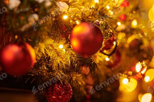 Preview: New Year christmas tree decorated Christmas balls with yellow flickering lights of garlands