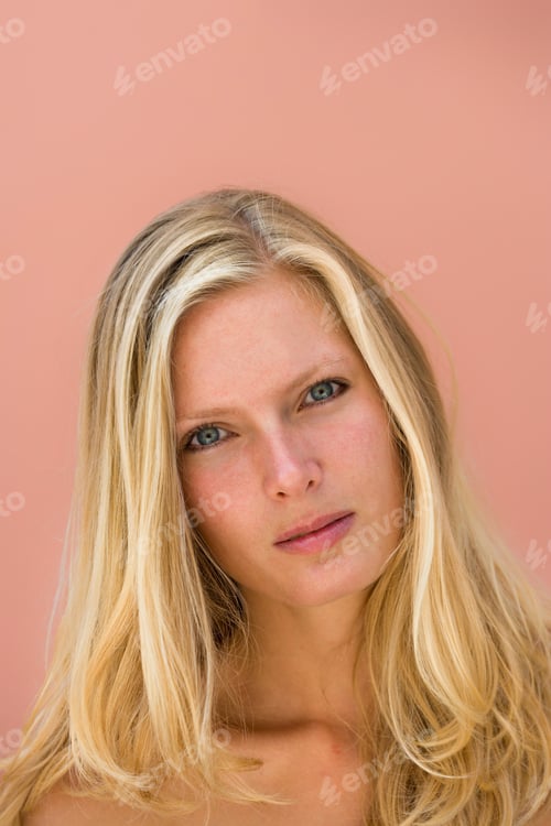 Preview: woman closeup portrait with on pink background