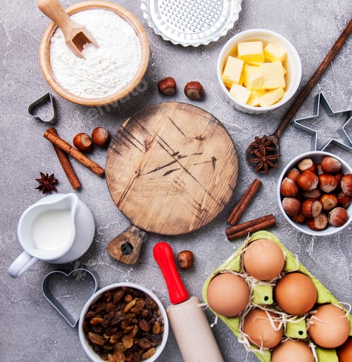 Preview: Top view of kitchen table with various ingredients