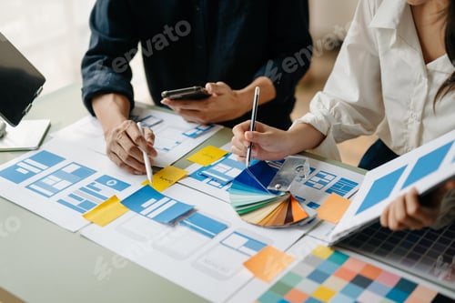 Preview: UX developer and ui designer brainstorming about mobile app interface wireframe design