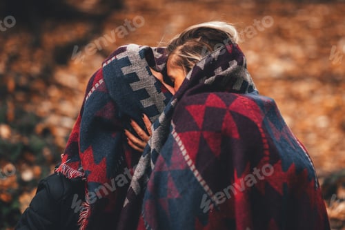 Preview: Young hipster couple in love with in the forest