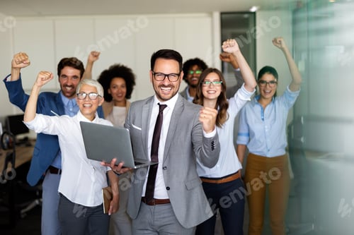 Preview: Success group of multiethnic entrepreneurs and business people achieving goals in corporate office