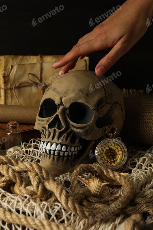 Preview: Columbus Day. Skull with a compass on the table